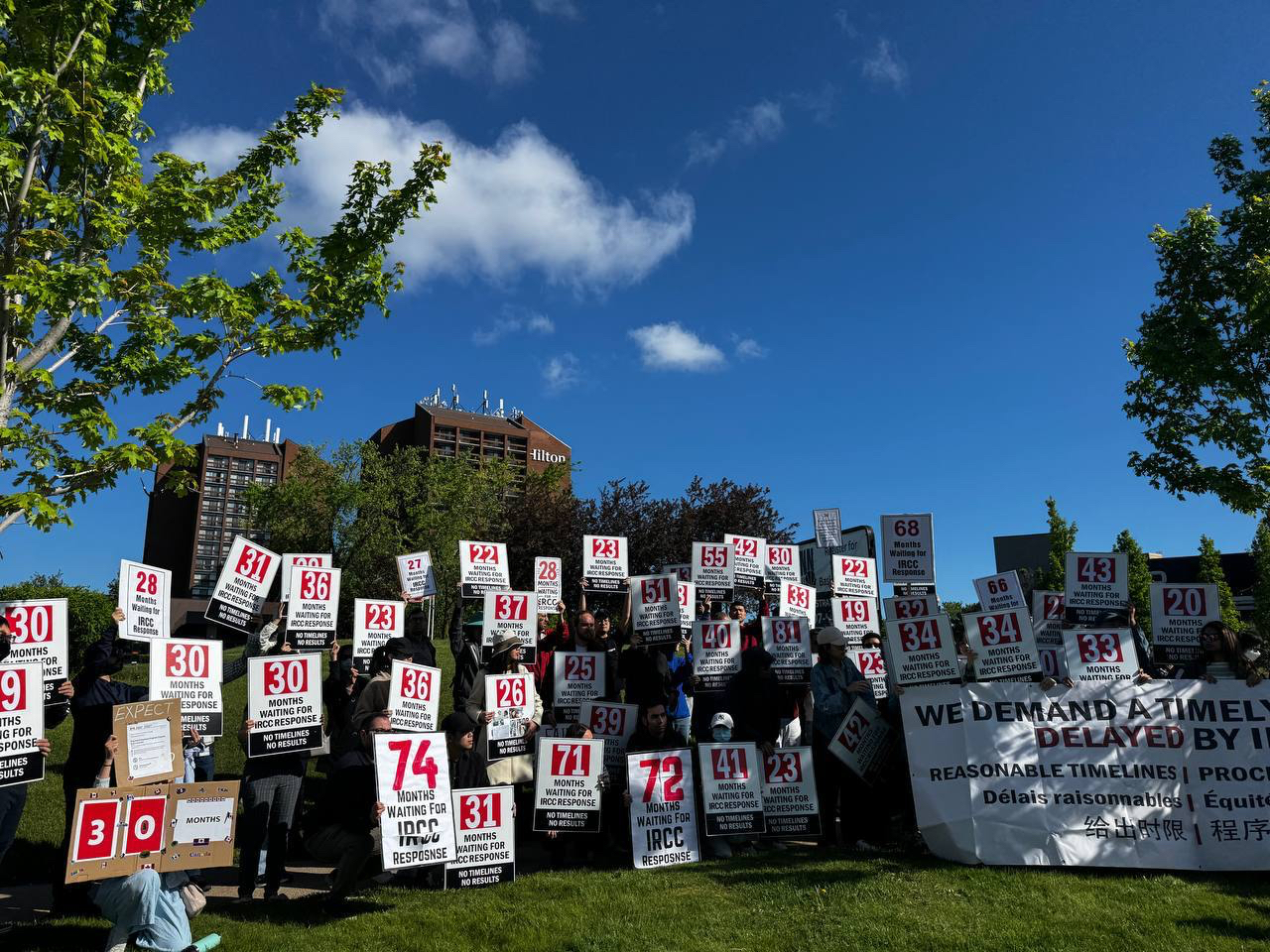 Community gathering in Mississauga highlighting prolonged IRCC waits